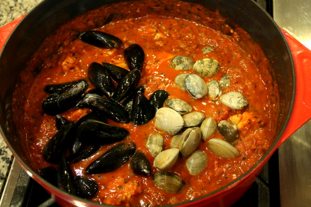 Add the mussels and clams
